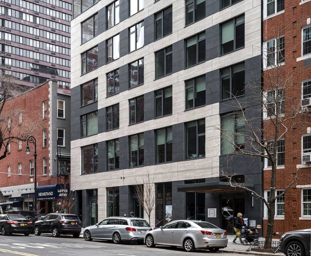 A view of where the Convivium’s exterior porcelain panels meet the Manhattan street level